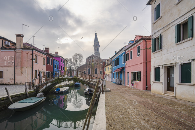 February 3, 2020: Burano, Venice, Island, Veneto, Italy, Northern Italy, colorful fishermen's houses, leaning church tower, Europe