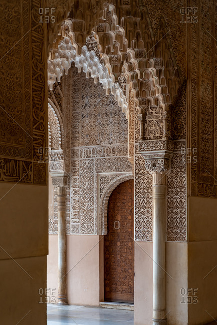 Granada, Spain - January 0, 1900: Moorish arches in the Court of the Lions in The Alhambra, Granada, Spain