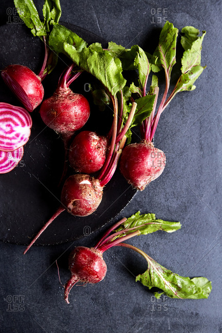 A bunch of beetroot on a moody background