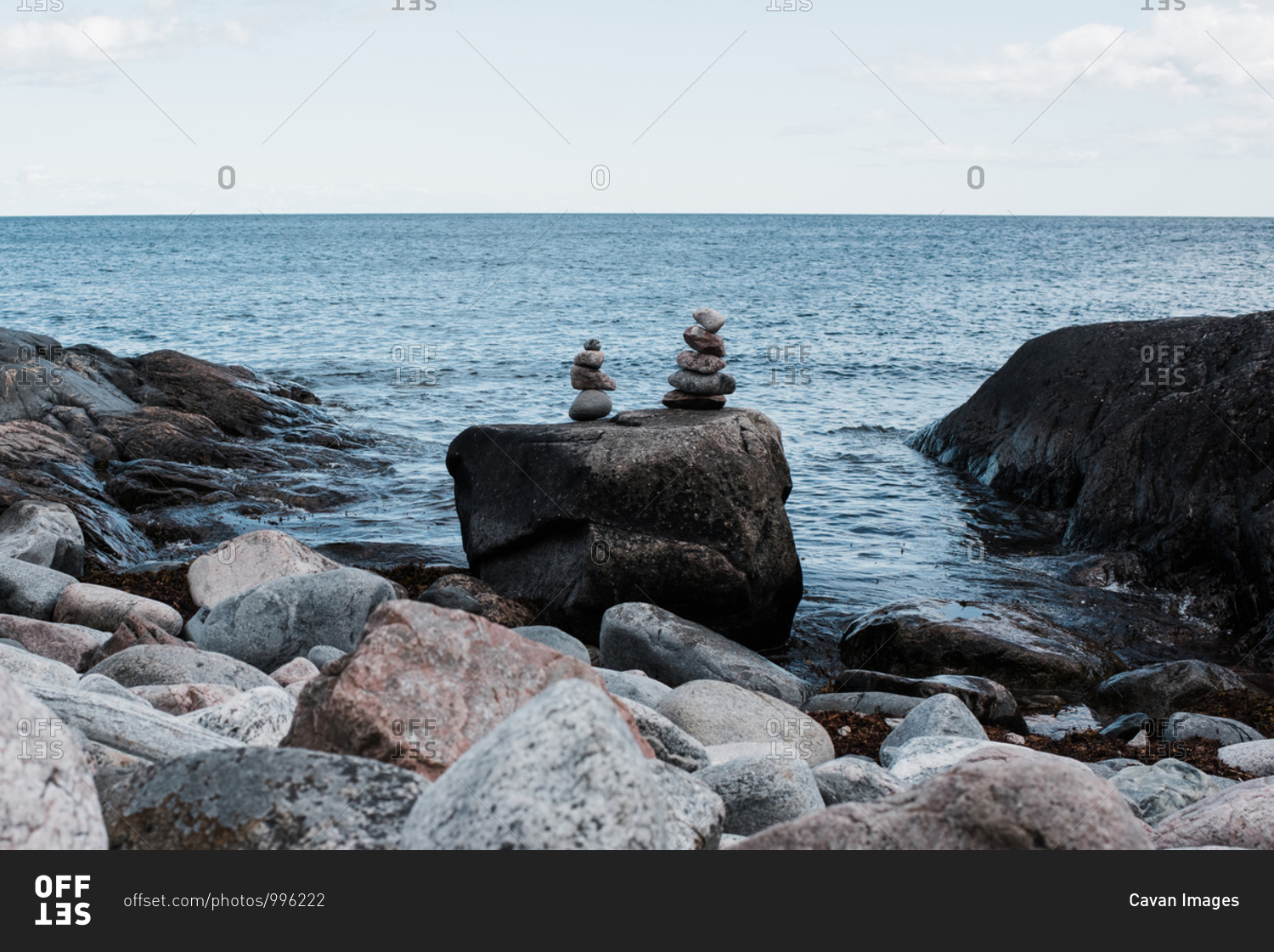 Stacked rocks by the ocean in sweden