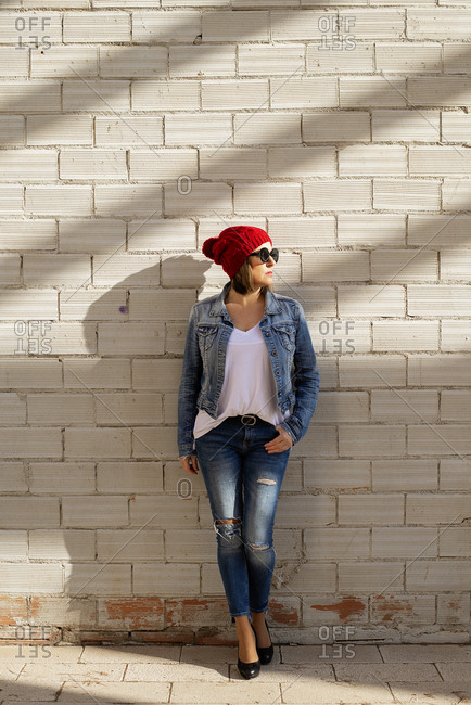 Red Lady leaning Wall – PhotoGraphy Club