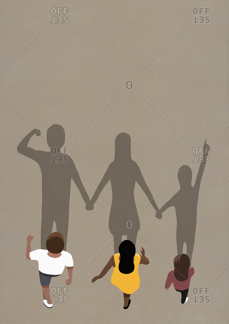Large shadows of family walking