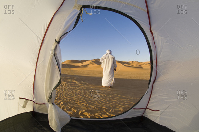 Tuareg outside tent in desert, Erg Awbari, Sahara desert, Fezzan, Libya