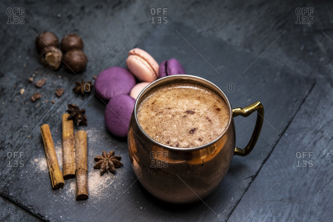 Hot chocolate, macaroons, cinnamon sticks, star anise