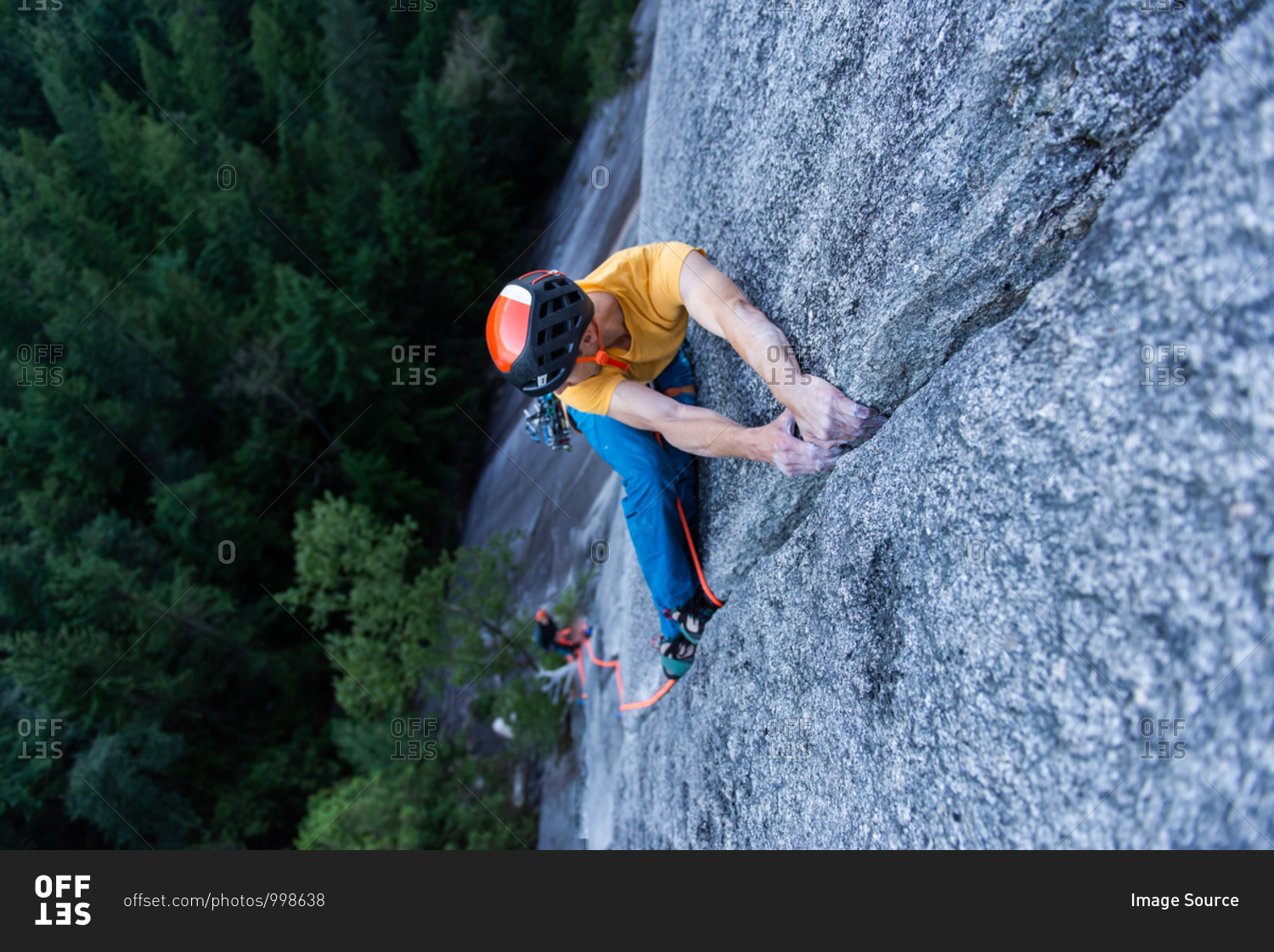 A climber traditional climbing  on granite, Tantalus Wall, Squamish