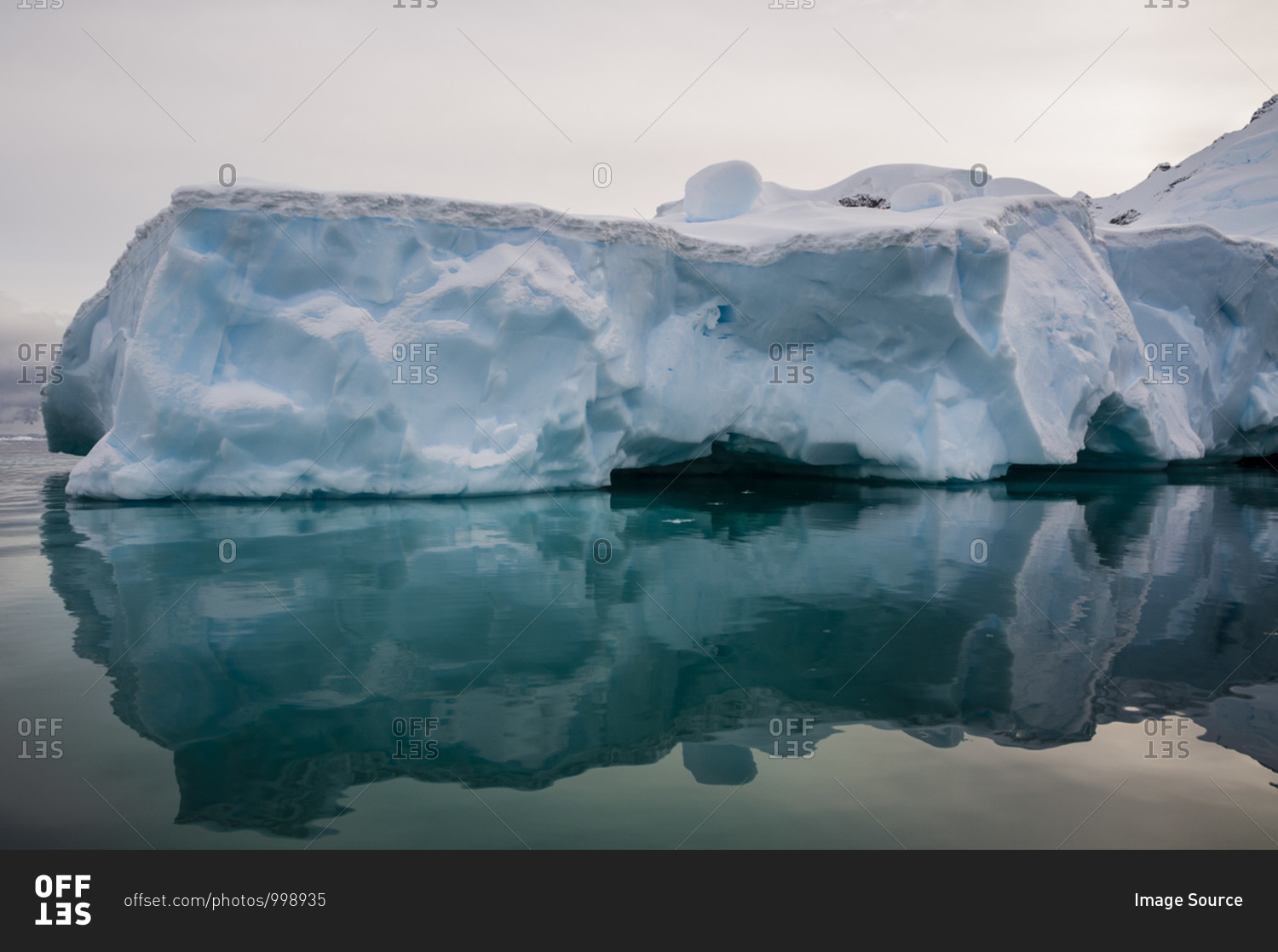 Reflections of ice shelf, Skontorp Cove, Paradise Bay, Antarctica