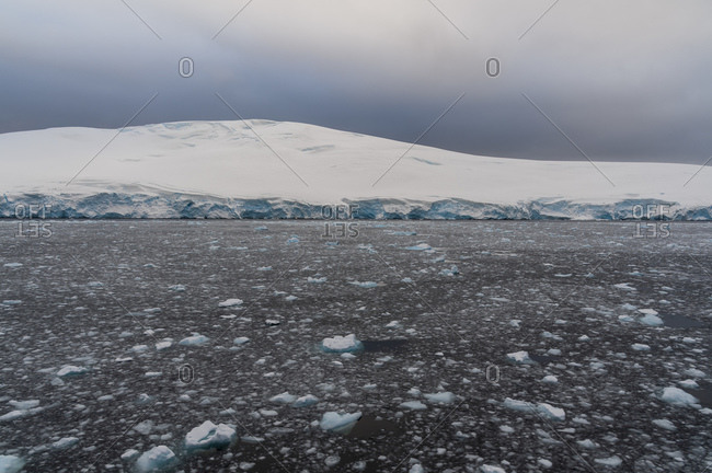 Snow covered hill, Lemaire channel, Antarctica