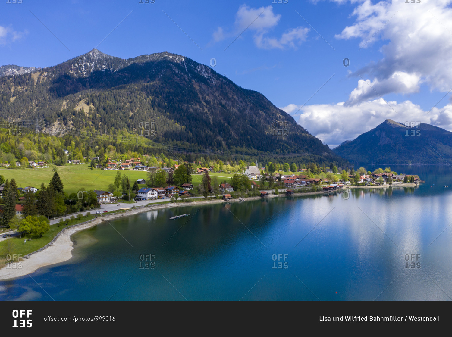 Germany- Bavaria- Kochel- Village on shore of Lake Walchen with Herzogstand mountain in background