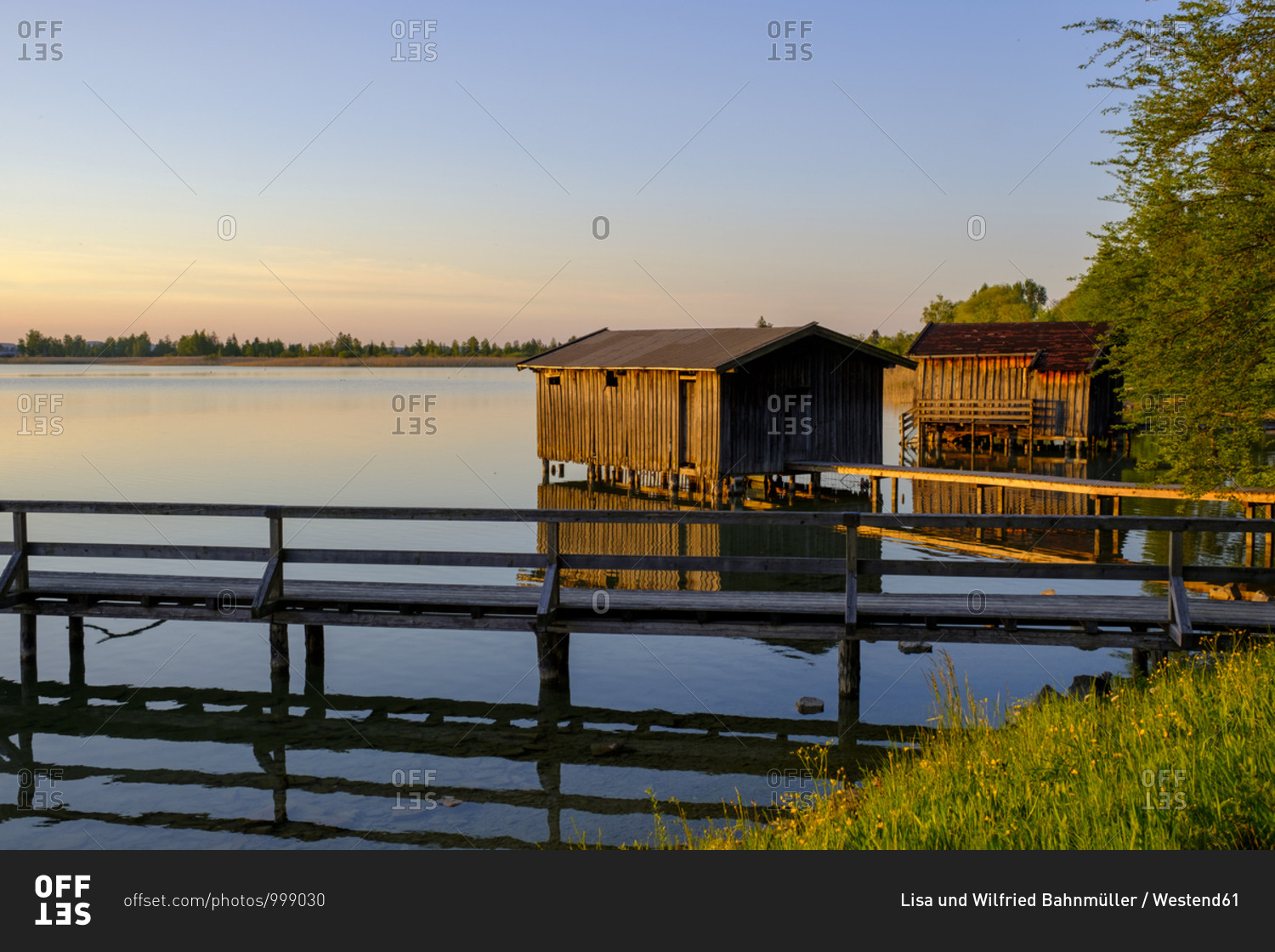 Germany- Bavaria- Upper Bavaria- Loisachtal- Kochel am See- Boathouse and pier on lake Kochel at sunset