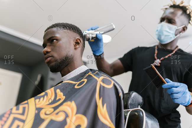 Black Man Hair Cut stock photos - OFFSET