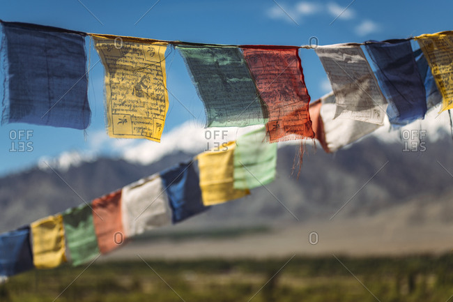 Colorful prayer flags hanging outdoors