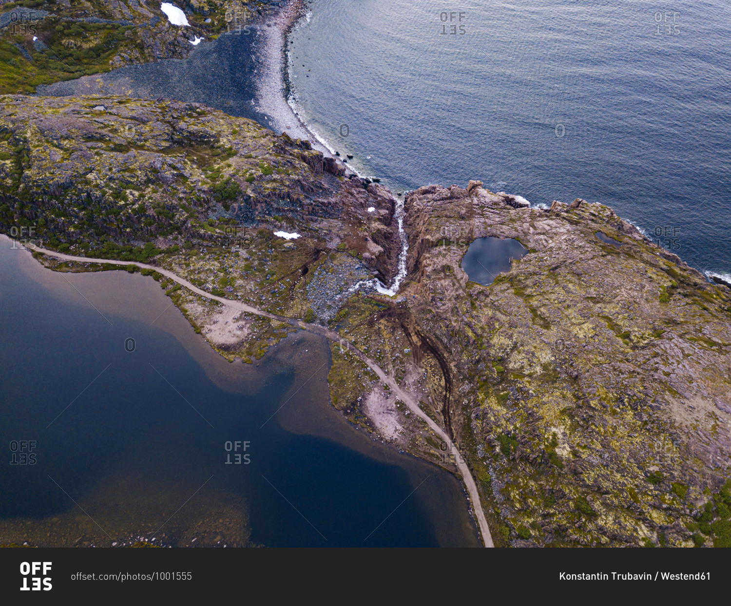 Russia- Murmansk Oblast- Teriberka- Aerial view of waterfall at coast of Barents Sea