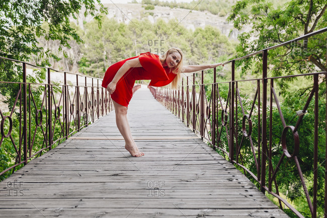 Ballerina dancing on Saint Paul Bridge in Cuenca- Spain