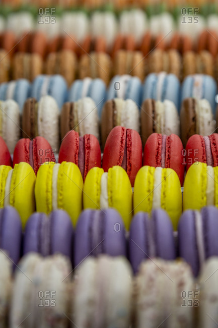 Rows of colorful macaroon cookies