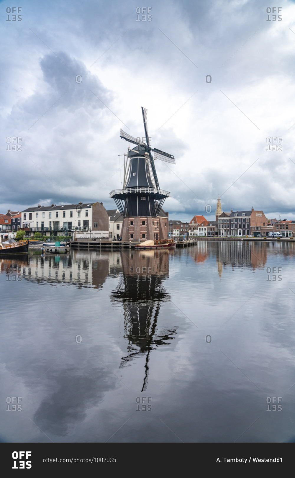 Netherlands- North Holland- Haarlem- Spaarne river canal and De Adriaan windmill