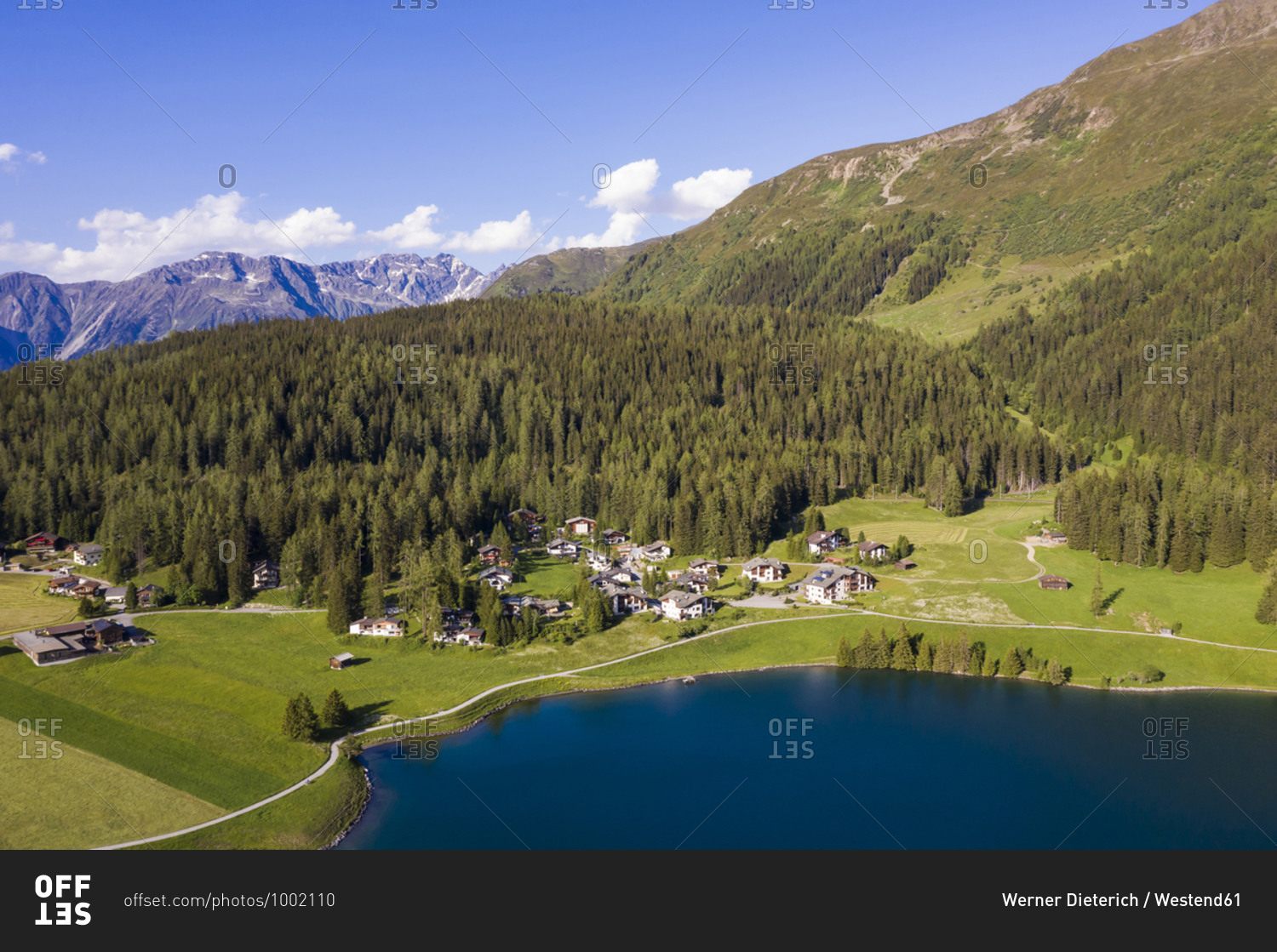 Switzerland- Canton of Grisons- Davos- Aerial view of villas on shore of Lake Davos in summer