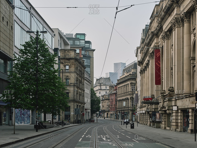 Manchester, United Kingdom - April 25, 2020: Deserted city center streets during lockdown period in the Coronavirus pandemic.