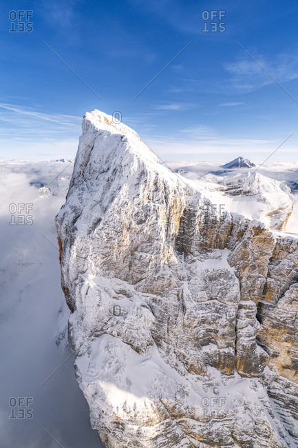 Rock face of Monte Pelmo covered with snow, aerial view, Dolomites, Belluno province, Veneto, Italy, Europe