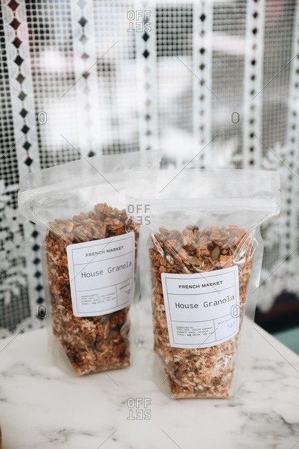 Packaged granola on marble table