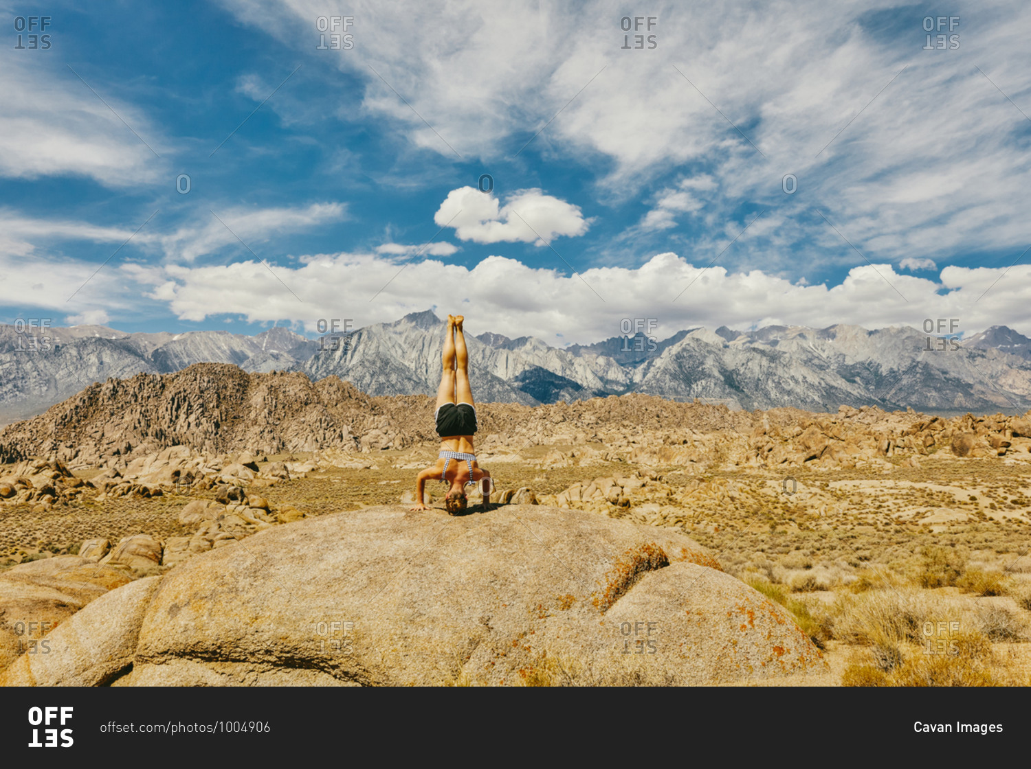 Young woman practicing yoga near Alabama Hills in northern California.