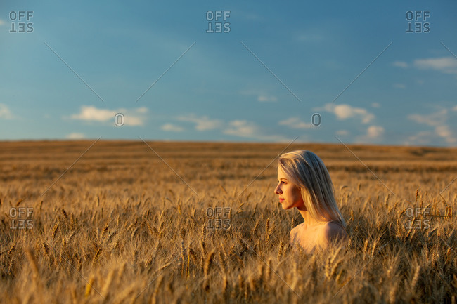 Nude in a field