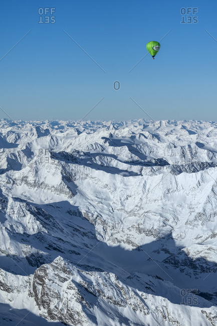 January 5, 2020: Passeier Valley, South Tyrol, Italy, Europe. Crossing the Alps in a hot air balloon. View from the balloon on the Texel Group, the Otztal Alps and the Silvretta Group