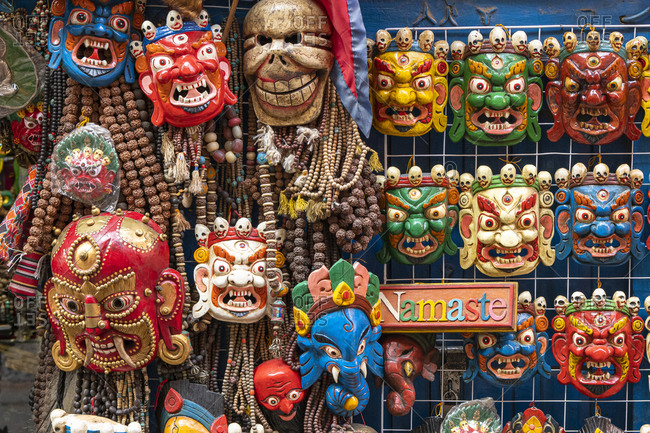Souvenir shop with typical wooden masks in Kathmandu in Nepal. The masks are traditionally worn at the Mani Rimdu festival to drive out demons and reward believers.