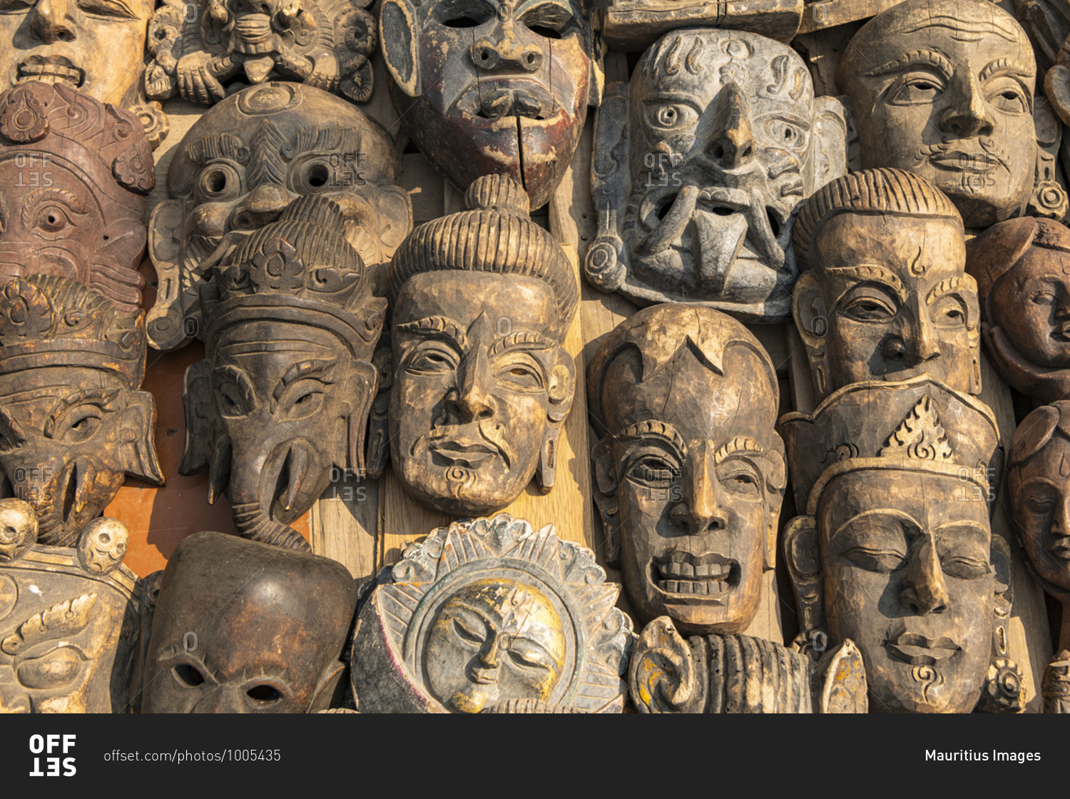 Souvenir shop with typical wooden masks in Kathmandu in Nepal. The masks are traditionally worn at the Mani Rimdu festival to drive out demons and reward believers.