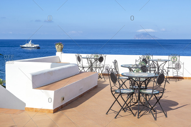 Roof-top hotel Punta Barone on the island of Salina with a view of the island of Panarea, Aeolian or Aeolian Islands, Sicily, Italy