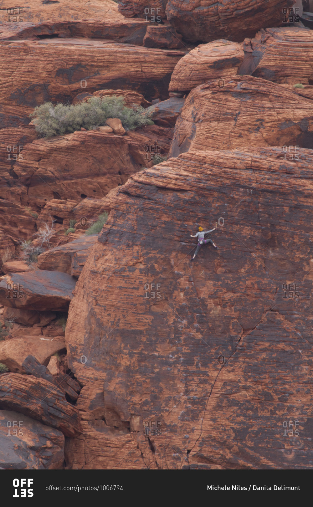 Rock climber at Red Rock Canyon, Las Vegas, Nevada.