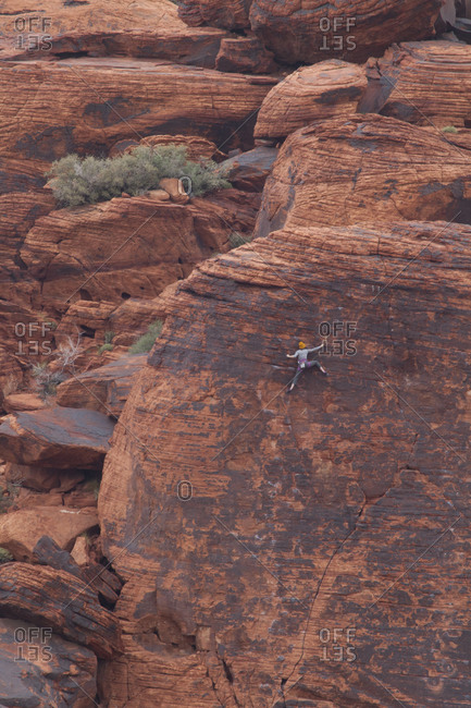 Rock climber at Red Rock Canyon, Las Vegas, Nevada.