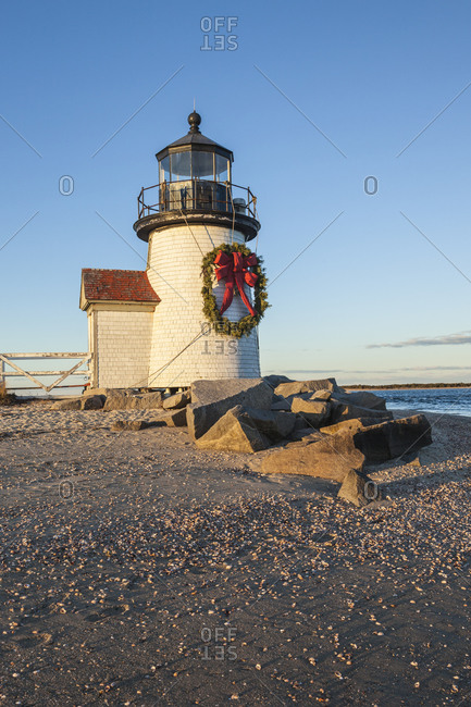 USA, Massachusetts, Nantucket Island. Nantucket Town, Brant Point Lighthouse with a Christmas wreath.