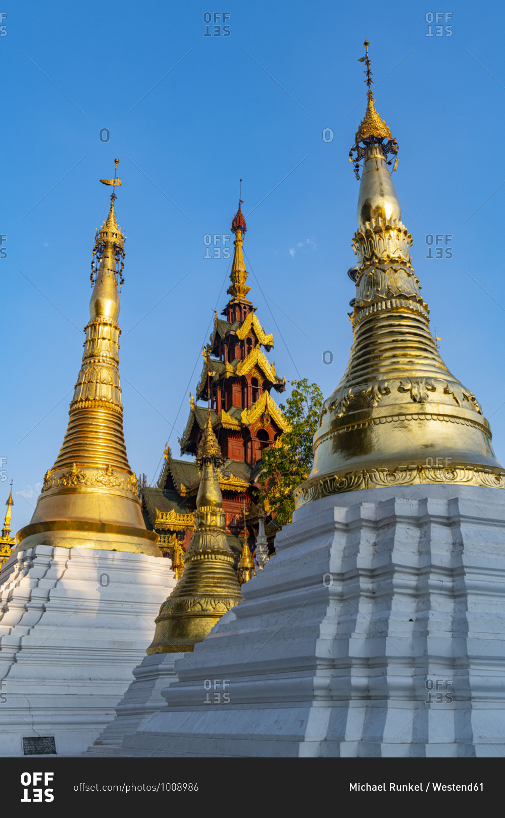Myanmar- Yangon- Golden spires of Shwedagon pagoda against clear sky