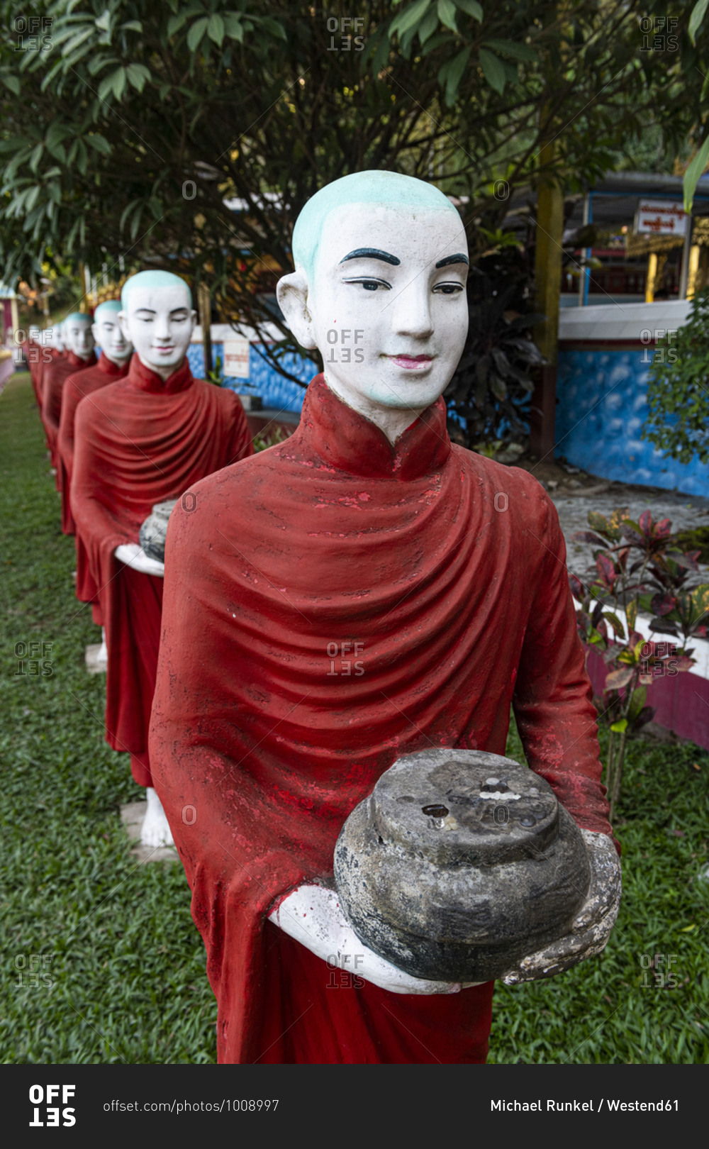 Myanmar- Kayin State- Hpa-an- Monk statues outside Kaw Ka Thawng Cave