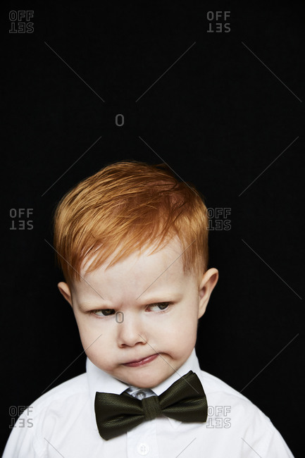 Portrait of a boy frowning