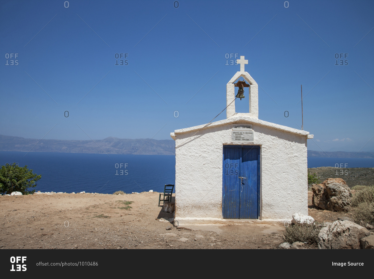 Small white washed church and mediterranean, Chania, Crete, Greece