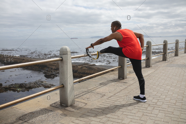 Smiling Young Disabled Woman Prosthetic Leg Running Outdoor Beach