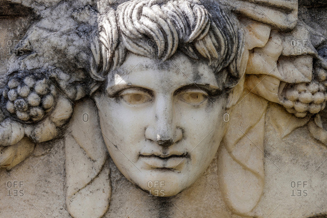 Turkey, Aphrodisias archeological Roman site, capital representing the head of a young man (UNESCO World Heritage)