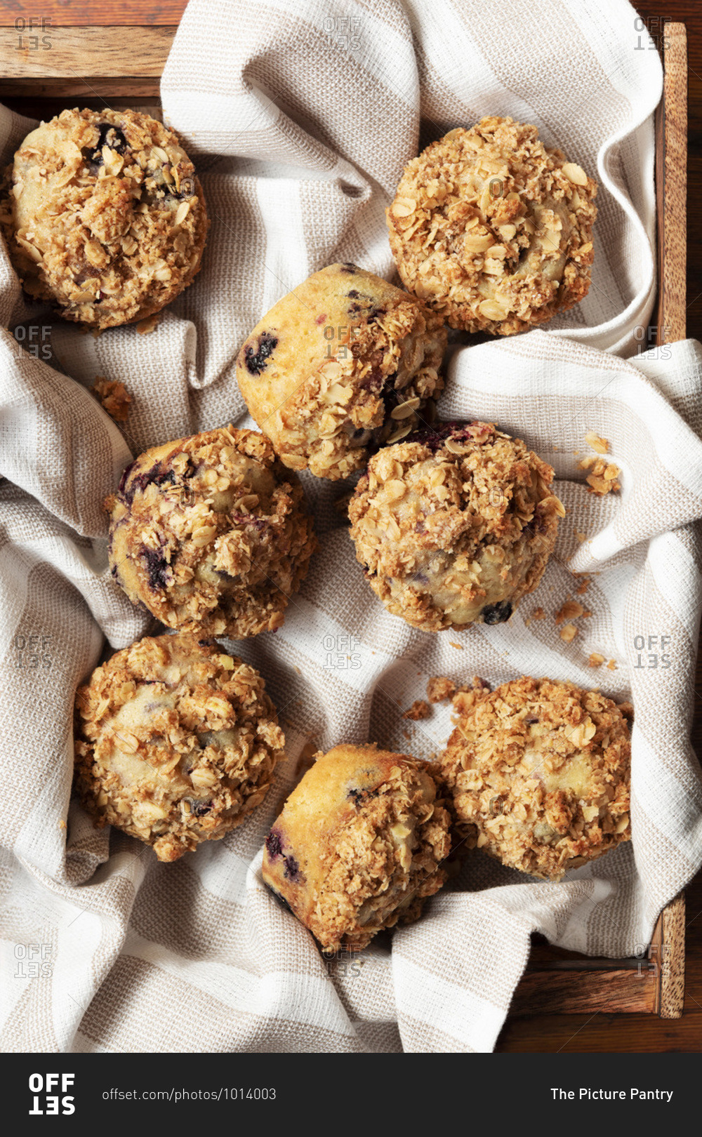Mixed berry muffins with oat crumble topping.