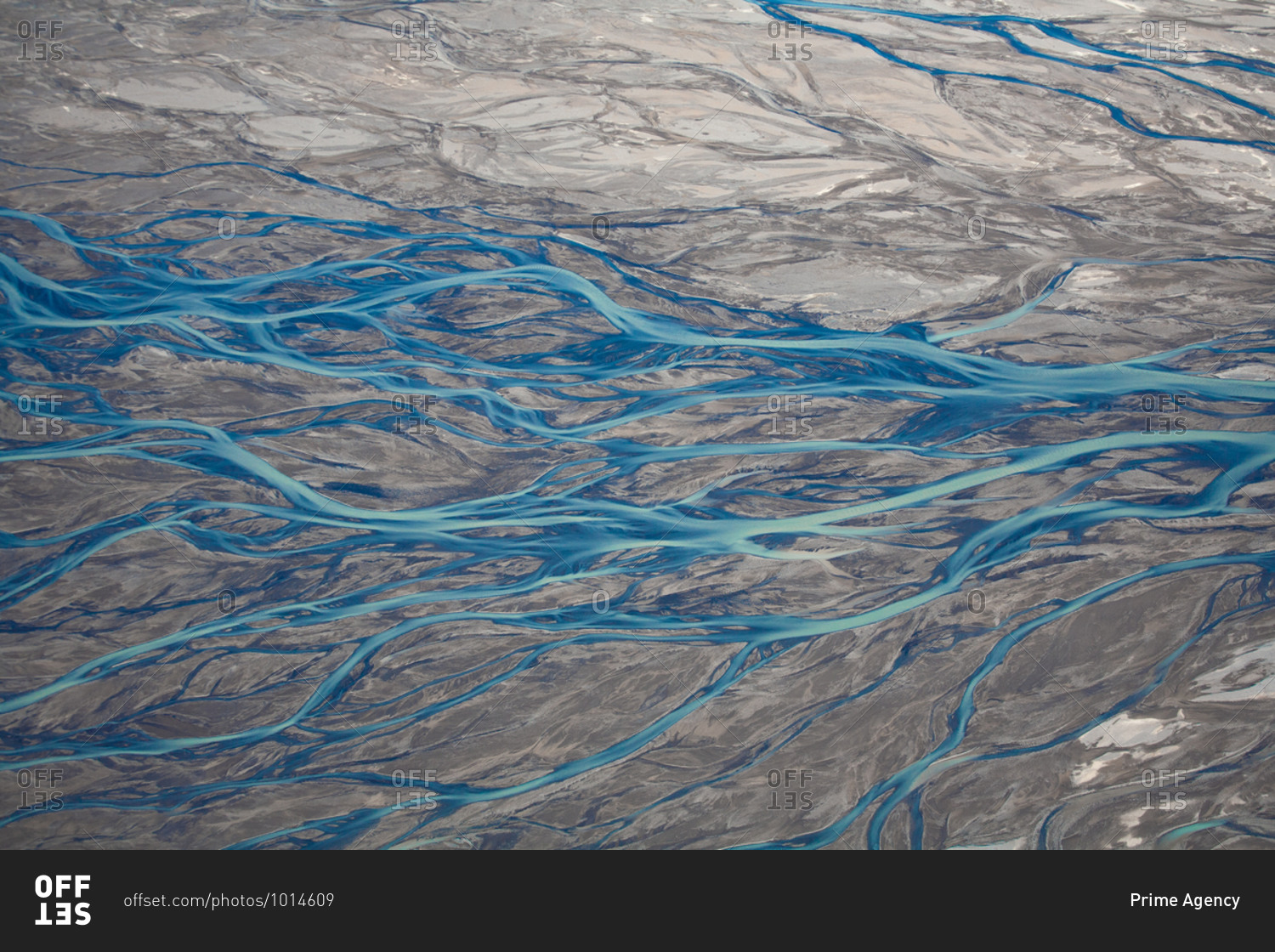 Rivers and streams running through rural Iceland seen from the sky