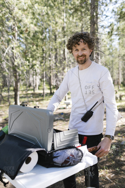 Man cooking at camping in Uinta-Wasatch-Cache National Forest