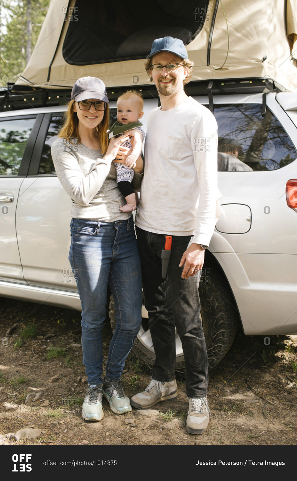 Portrait of parents with baby son (6-11 months) on camping in forest, Wasatch-Cache National Forest