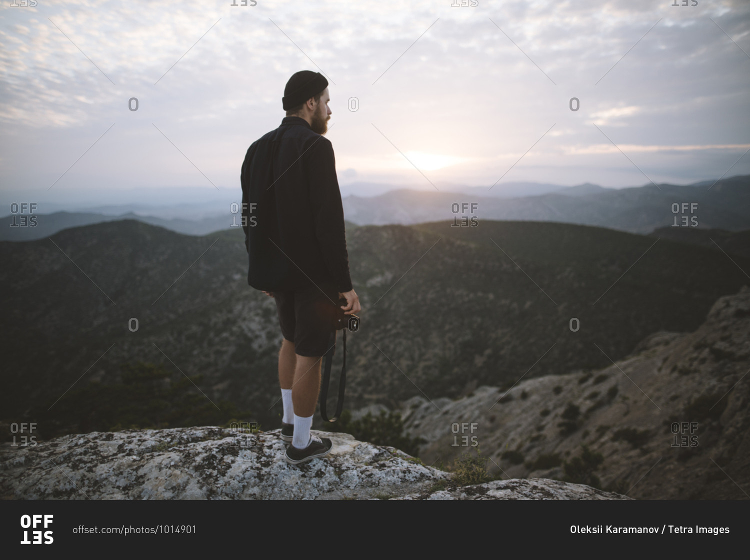 Italy, Liguria, La Spezia, Man looking at mountain range from mountain top