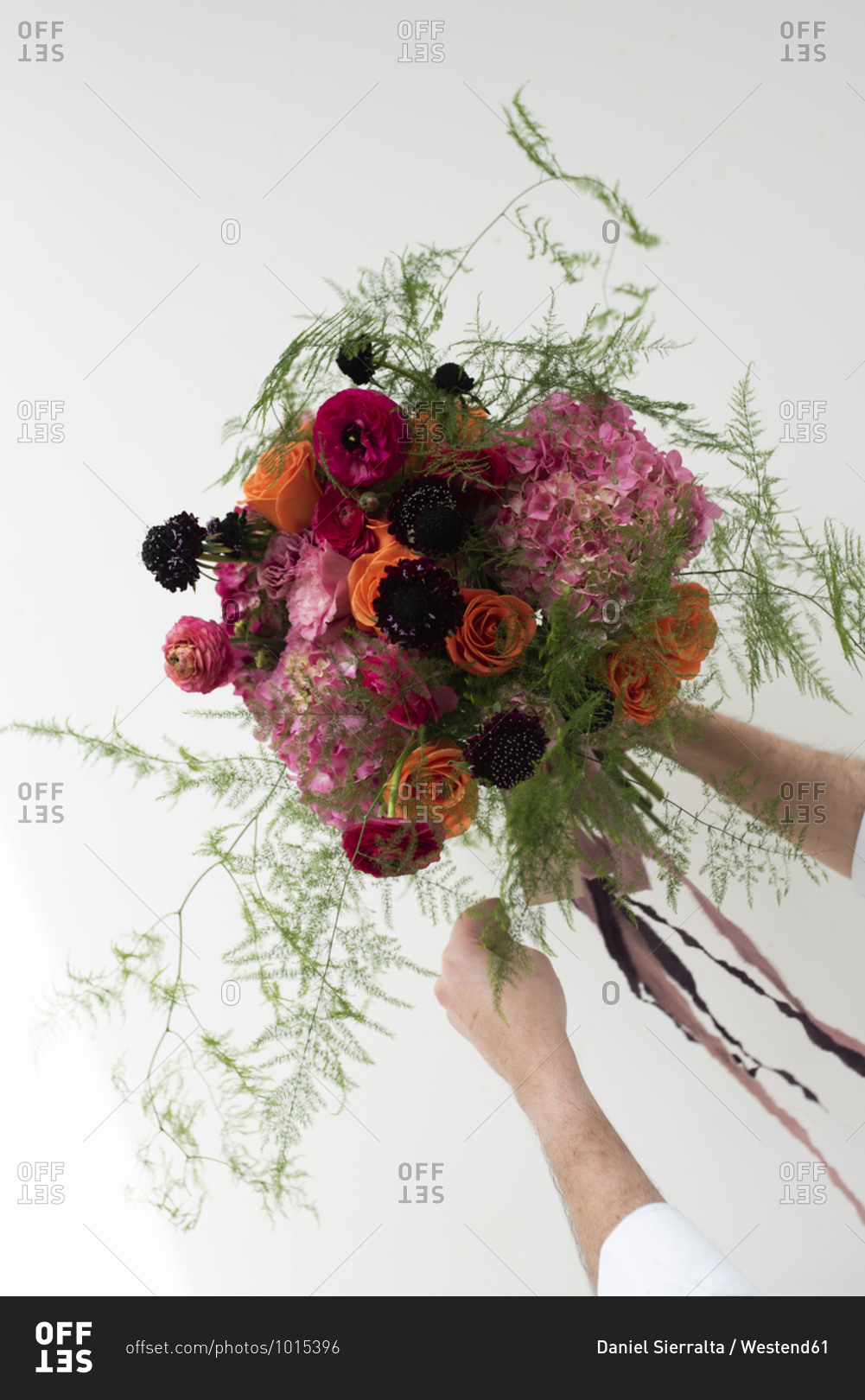 Studio shot of pink- red and purple bouquet of summer flowers