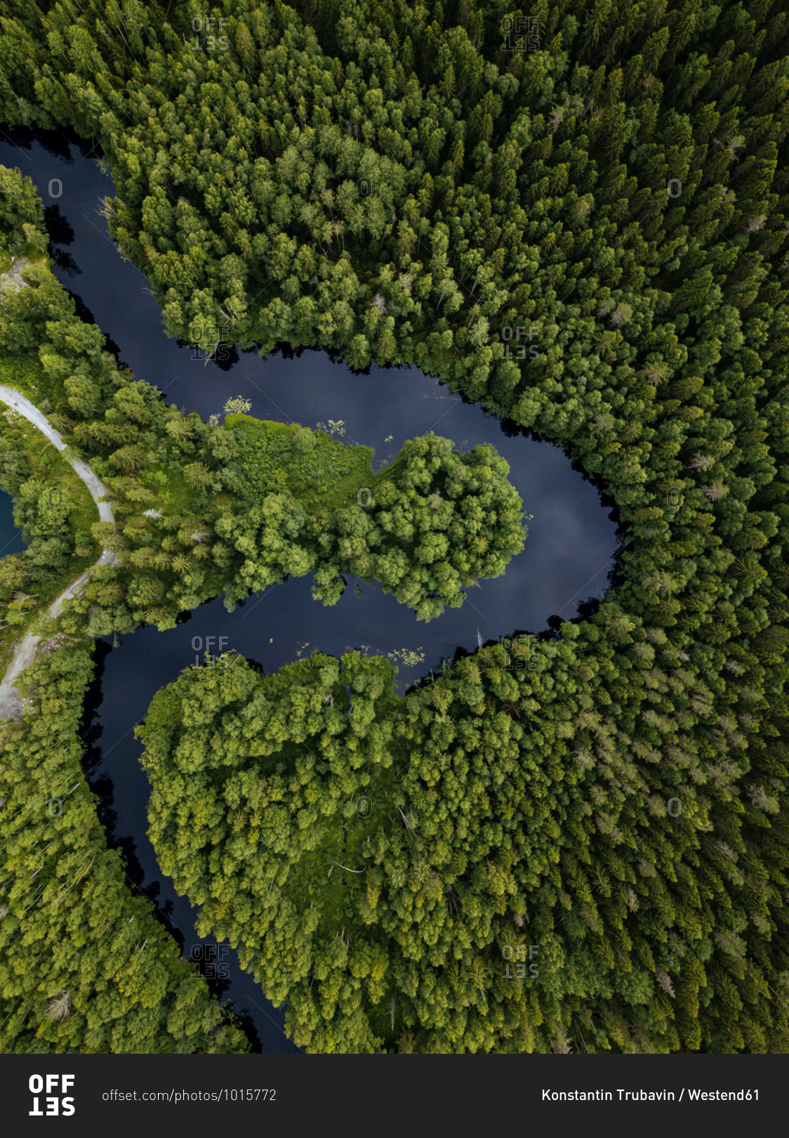 Russia- Republic of Karelia- Sortavala- Aerial view of green forest surrounding curve of Tohmajoki river in summer