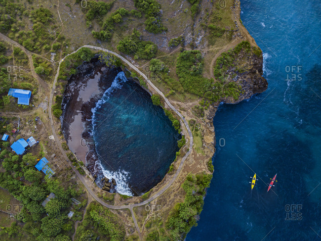Indonesia- Bali- Aerial view of kayakers at Broken Beach