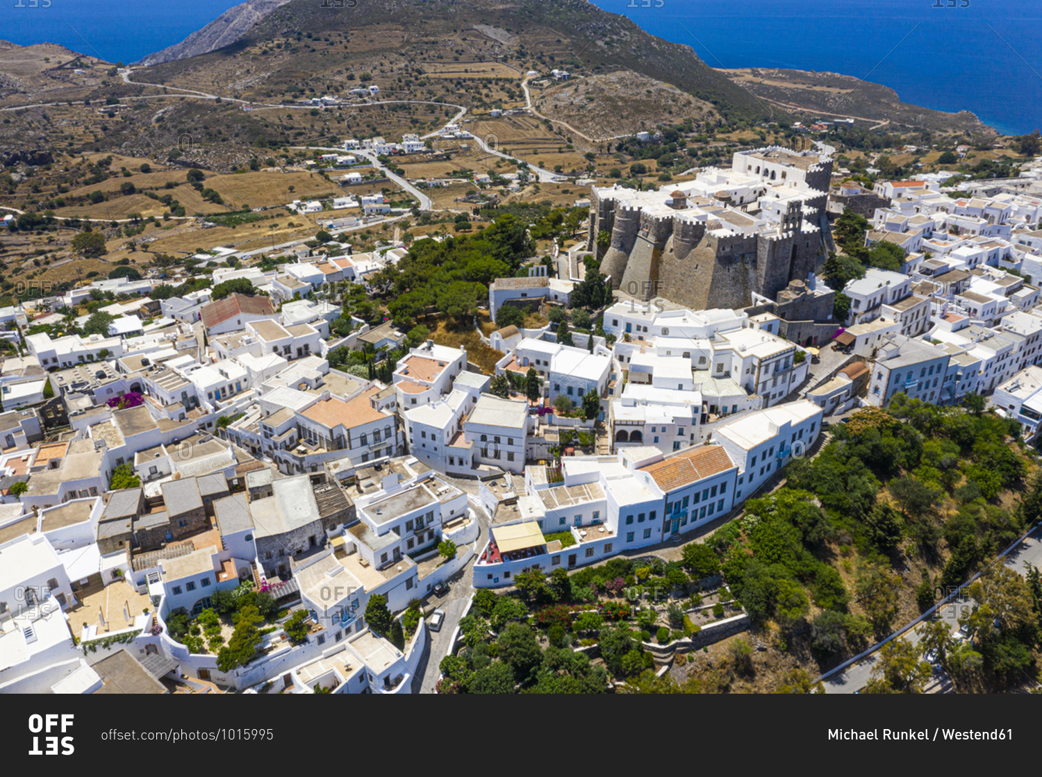 Greece- South Aegean- Patmos- Aerial view of Monastery of Saint John the Theologian and surrounding town