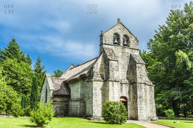 France,  Limousine,  Coreze,  Lestards village,  church Saint Martial (12th-15th century,  Historical Monument) with tatched roof (12th-15th century,  Historical Monument)