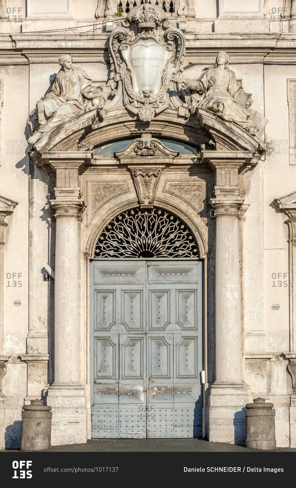 Europe,  Italy,  Rome,  Quirinal district,  door and coat of arms of Pope Corsini on the Palace of the Consulta (18th century by Fernando Fuga) which houses the Constitutional Council