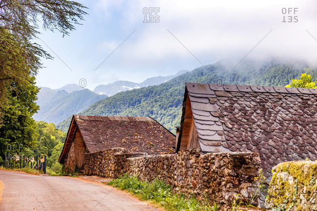 stone house in the village of Audressein in Ariege department,  in Pyrenees mountains,  Occitanie region,  France